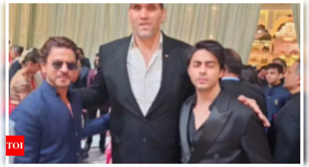 Shah Rukh Khan and son Aryan Khan pose with The Great Khali at Anant Ambani and Radhika Merchant's 'Shubh Aashirwad' ceremony | Hindi Movie News Filmymeet