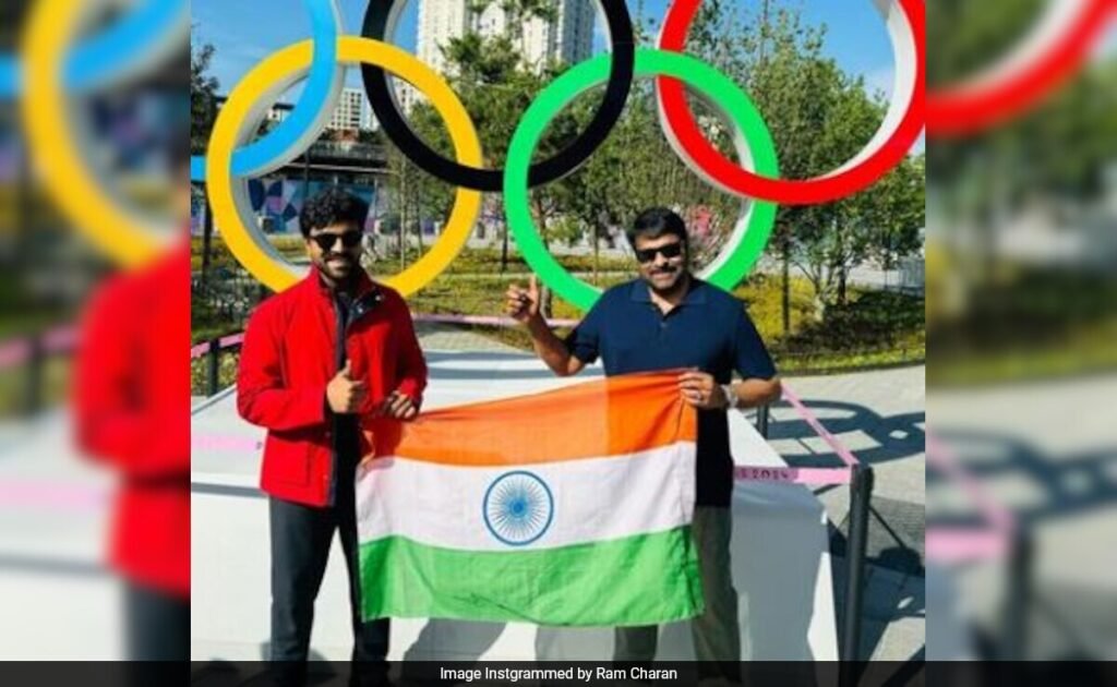 Just Chiranjeevi And Ram Charan Posing With Tricolour FilmyMeet