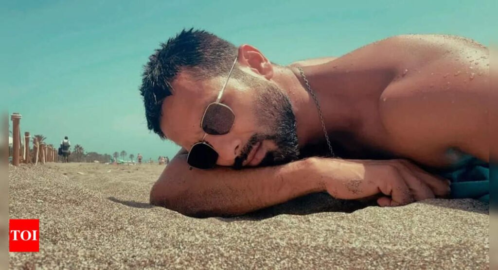 Shahid Kapoor shares a photo 'chilling' on a beach from his vacation with Mira Rajput; fans REACT - See photo | Filmymeet