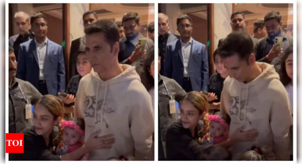 Akshay Kumar gets visibly uncomfortable after a female fan keeps a hand on him while posing for photos; fan says 'People take them for granted' - WATCH video | Filmymeet