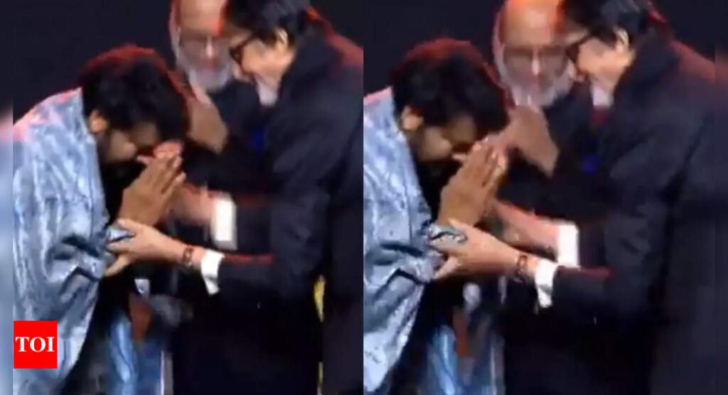 Chiranjeevi touches Amitabh Bachchan's feet with respect at a recent award ceremony hosted by Nagarjuna Akkineni's family Filmymeet