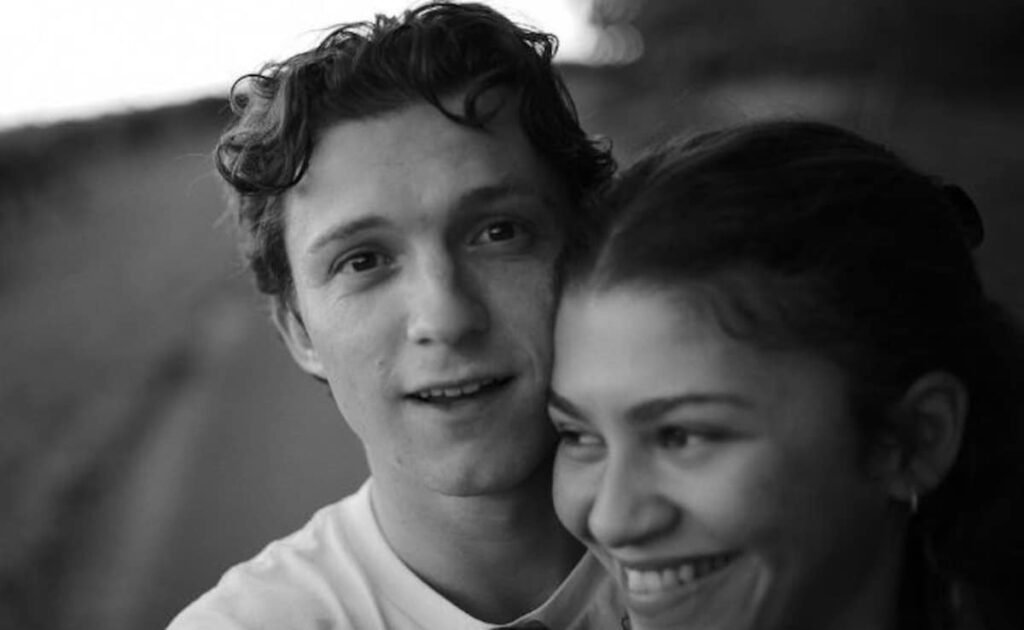 Tom Holland Is A Caring Boyfriend As He Protects Zendaya From Paparazzi. Watch FilmyMeet